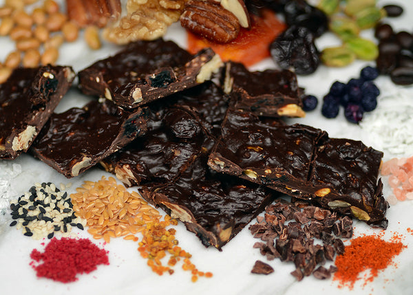 Brooklyn Bark - HANDCRAFTED MELTING POT of dark chocolate with assorted nuts and fruits, flax, sunflower, chia seeds coconut, spices and grey sea salt. Ingredients